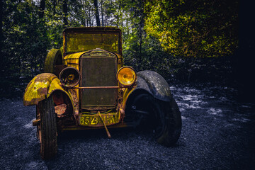 The golden old abandoned car.