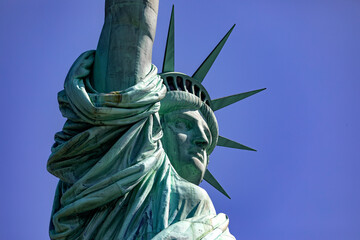 Photo of the Statue of Liberty, holding her huge torch in the Big Apple, a monument known as the...