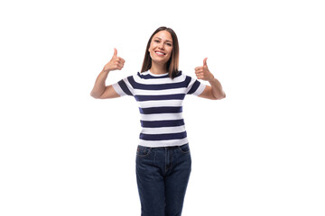 pretty slim young brunette woman in a striped t-shirt on a white background with copy space