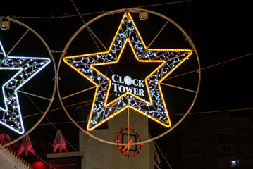 Capture the festive charm of the Christmas lights and tree in Torremolinos, Spain