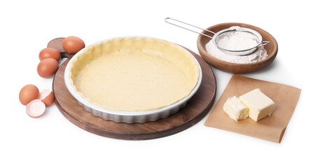 Quiche pan with fresh dough and ingredients isolated on white