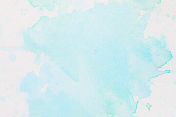 Abstract liquid art background. Blue watercolor translucent blots on white paper.