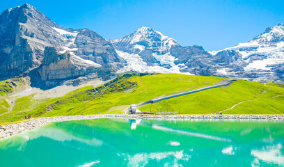 Swiss Alps and beautiful Fallbodensee mountain lake, Jungfrau region, Switzerland - 695843468
