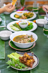 Tradition Northern Thai food. on a wooden table