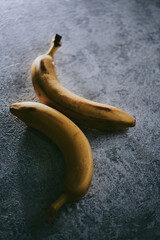 Close-up of bananas on gray textured background