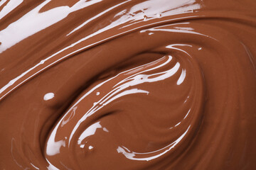 Tasty chocolate paste as background, closeup view