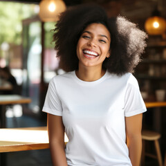 African American woman smiling wearing White T-shirt for Mockup, with Cafe background. Blank T-shirt for mockup