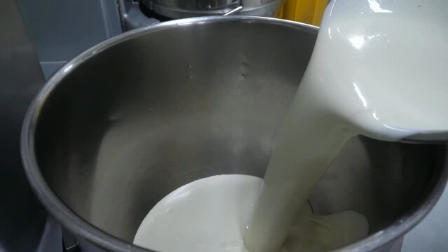Combining ingredients for fluffed cream cheese.