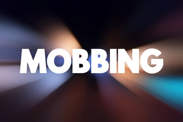 Mobbing - sociological term, means bullying of an individual by a group, text concept background