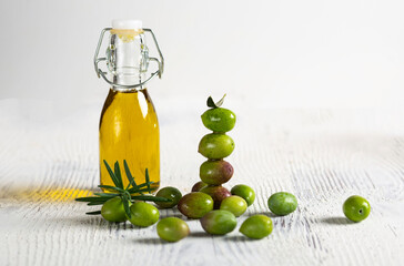 breakfast, olive oil, freshly pressed, olive pressing, oil on bread, olive oil in a glass bottle, on a white background.lined up olives, natural olive harvest, advertising,