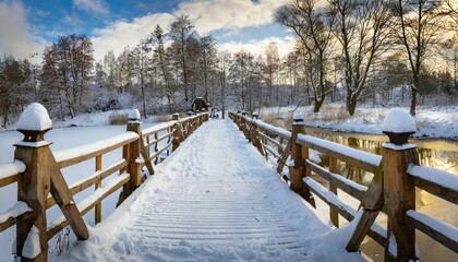 snowy wooden bridge in a winter day stare juchy poland