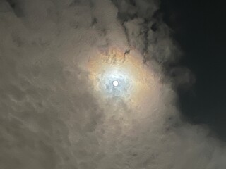 Iridescent clouds moon