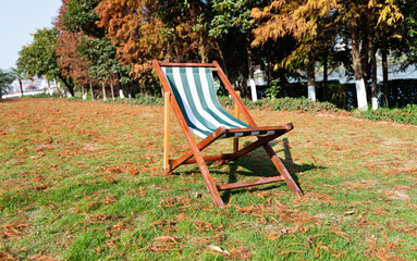 Deck chair in autumn park