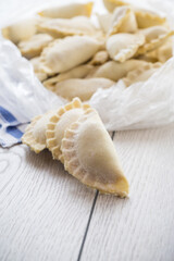 Raw dumplings with filling inside, Ukrainian cuisine.