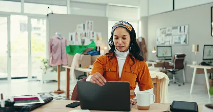 Creative woman, laptop and coffee in small business, fashion or clothing design at office. Female person, tailor or employee with tea and computer for morning startup or productivity at workplace
