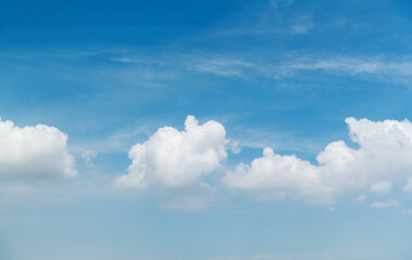 White clouds are in the blue sky