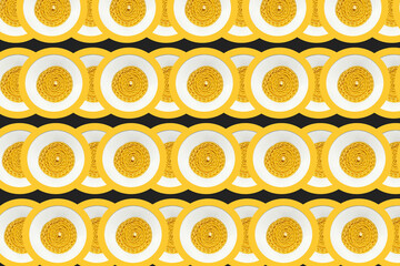 Pattern with a paraffin yellow twisted candle top view