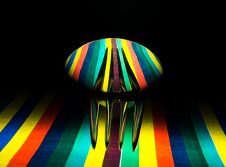 reflection of colours on forks and spoons