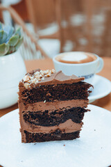 slice of chocolate cake served on plate on table