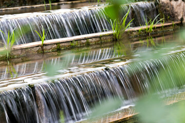 Water running down the stone step