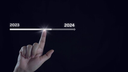 Businessman touch on virtual bar status to change from 2023 to 2024, countdown of merry Christmas...