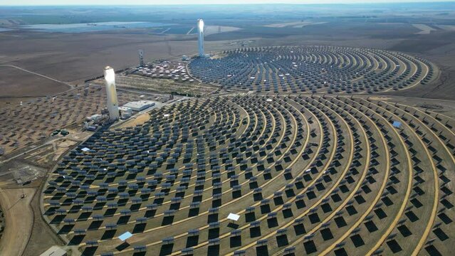Aerial view of the Solar Power Towers PS10 and PS20 in Sanl&uacute;car la Mayor, Seville. Spain's stunning solar energy plant.  Concentrated solar power plant. Renewable energy. Green energy.