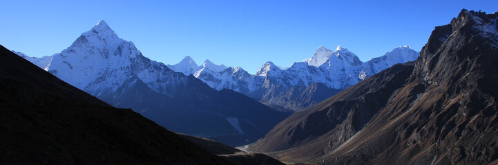 Famous Mount Ama Dablam and other high mountains in the Everest National Park, Nepal.