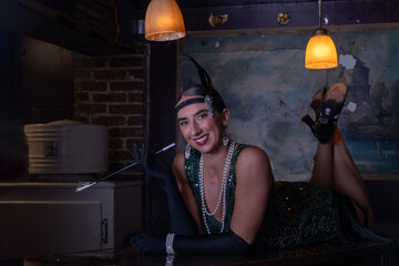 Roaring 20's flappers in basement speakeasy bar