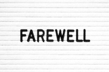 Black color letter in word farewell on white felt board background
