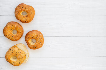 Set of fresh bread bagels, top view. Homemade baked bread