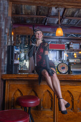 Roaring 20's flappers in basement speakeasy bar