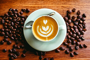 cup of coffee with beans