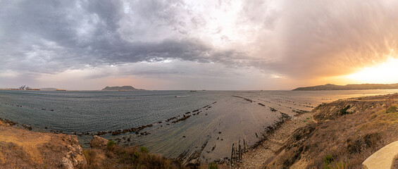 Getares beach in Algeciras is flanked by flysch formations, Strait of Gibraltar Natural Park, Algeciras, Spain