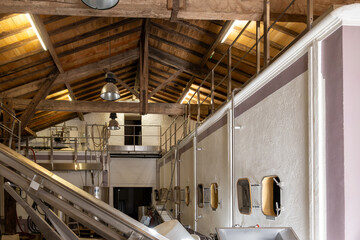 Concrete tanks for first fermentation of grapes, Bordeaux Saint-Emilion wine making region, harvest...