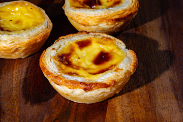 Portugal's traditional sweet dessert Pastel de nata egg custard tart pastry in cup