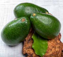Green ripe avocado fruits from organic avocado plantation - healthy food