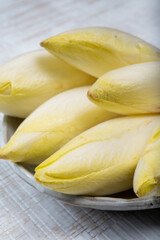 Fresh organic chicory endive salad ready to eat, traditional food in Belgium and the Netherlands