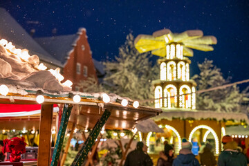 Bavarian Christmas Market at night with illuminated warm lights