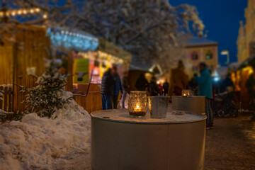 Bavarian Christmas Market at night with illuminated warm lights