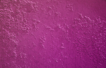 Texture of a metal wall with an old paint coating that spoils under the influence of time and weather