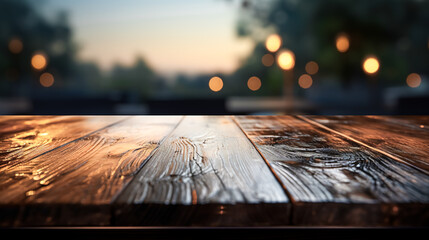 Surface of a wooden table on a blurred nature background with bokeh. - obrazy, fototapety, plakaty