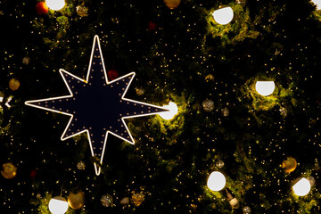 Fototapeta na wymiar Decorated Christmas tree with lighting and X'mas ball background