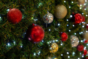 Decorated Christmas tree with lighting and X'mas ball background
