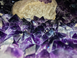 Close up of undulating amethyst. Beautiful natural crystals gemstone.