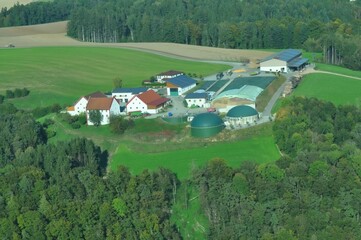 Aerial view of Vilshofen countryside. Panoramic aerial view on Wenninger wood chips production....