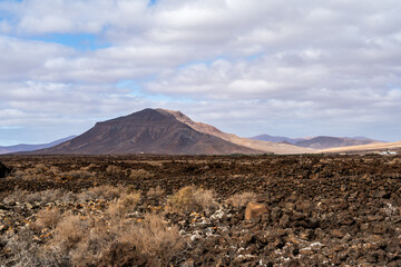 Warm Desert Serenity: Majestic Volcanic Landscape with a Dreamy Touch