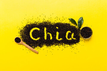 chia word made from chia seeds top view on colored background. Healthy superfood