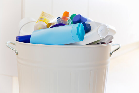 Plastic waste in a white garbage can in a throwaway society causing microplastics