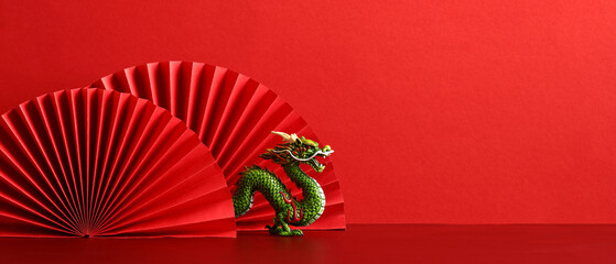 Lunar New Year 2024 background. Chinese dragon with red paper fans on red background. - obrazy, fototapety, plakaty