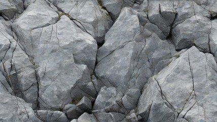Grauer Felsbeschaffenheitshintergrund. dunkelgraue raue Bergoberfläche mit Rissen. Strukturierter weißer schwarzer Steinhintergrund mit Platz für Design